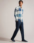 NEETLY-Shirts-Crafted from a blend of cotton and lyocell, NEETLY offers all-day comfort. This shirt's timeless silhouette adds to its wear-anywhere appeal, while the check print adds easy texture to your outfits. Button up shirt Large house check print Cotton and lyocell blend Long sleeves Classic collar Branded label O'Shea is 6'2.5" / 1.89m and wears Medium Blue in a Ted size 3- Ted Baker Romania